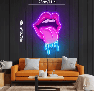 Neon sign of lips on a dark wall above an orange sofa
